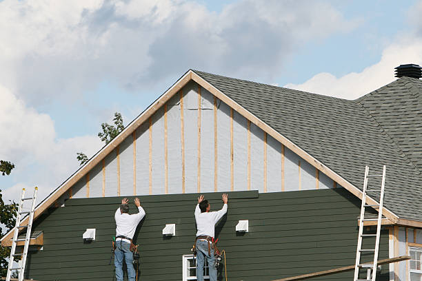 Professional Vinyl Siding technician working in Madison, OH